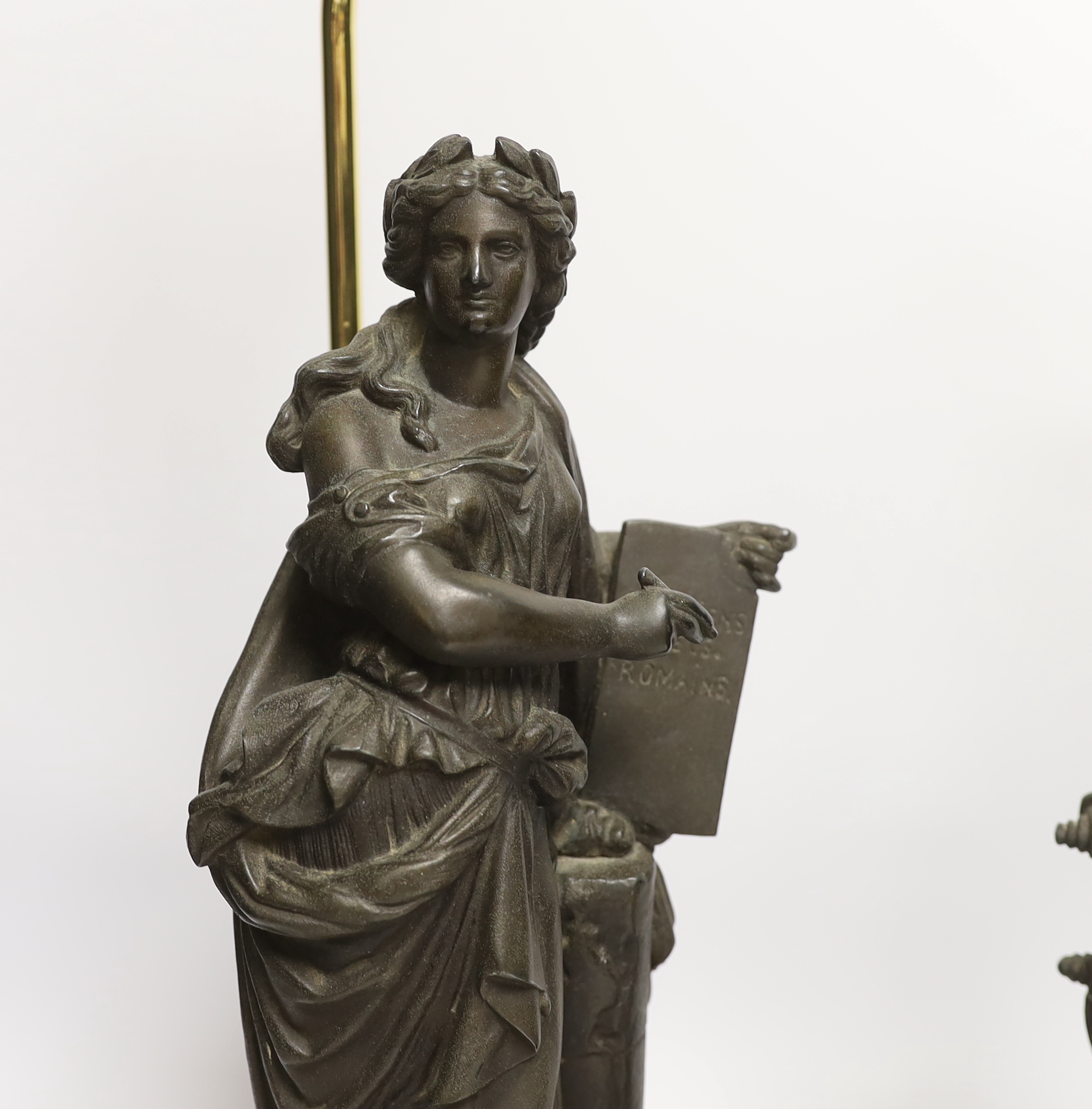 A pair of spelter figural table lamps emblematic of poetry and history, overall 56cm high
